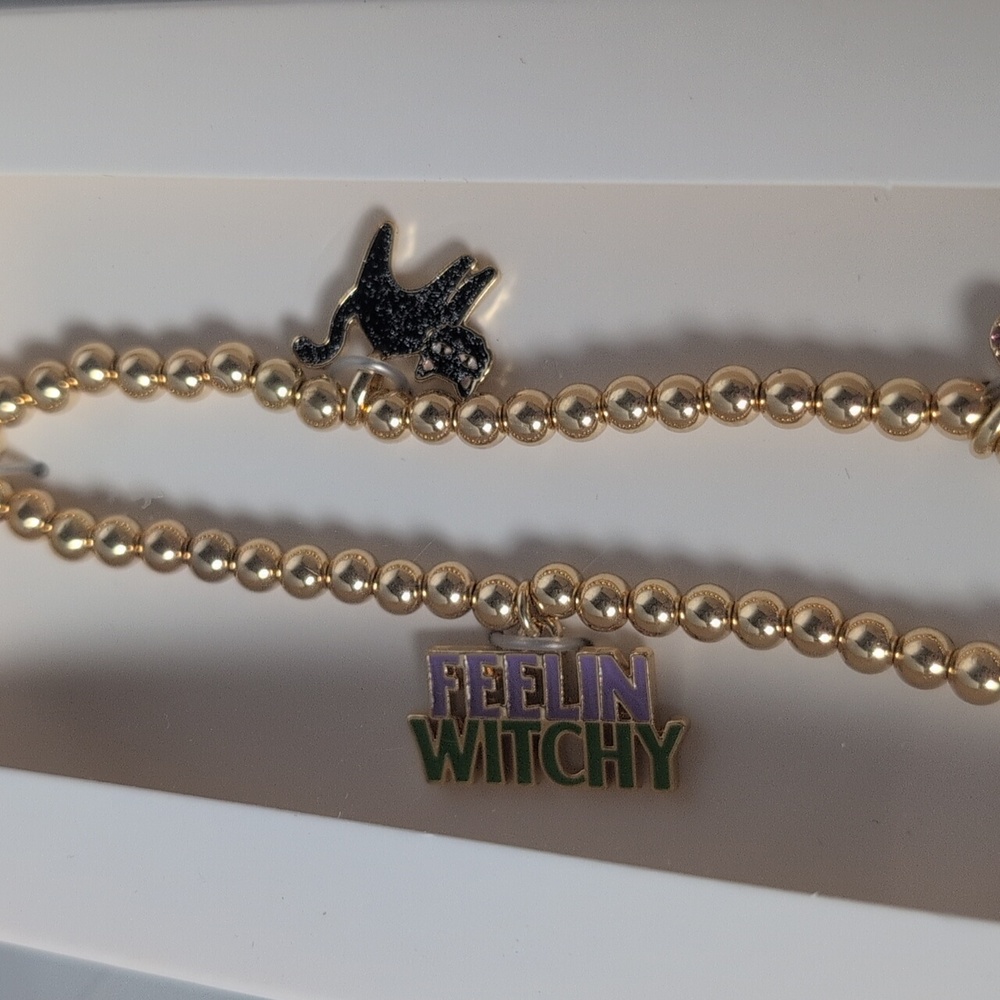 BaubleBar Halloween Themed Gold Tone Phone Charm Wristlet - Picture 2 of 7